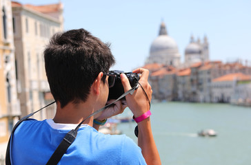 Fototapeta na wymiar Young photographer in Venice in Italy