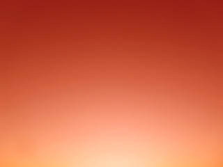 Abstract red orange background. Gradient. Sun shine. Color lush lava trend of 2020. Bright colorful...