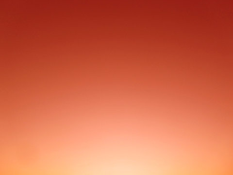 Abstract red orange background. Gradient. Sun shine. Color lush lava trend of 2020. Bright colorful background for your design.