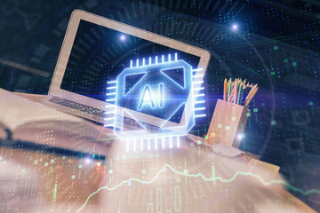 Double exposure of desktop computer and technology theme hologram. Concept of software development.