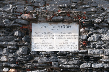 Portovenere, Italy: commemorative plaque to Lord Byron, English poet who swam the distance that...