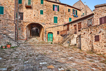 Fototapeta na wymiar Seggiano, Grosseto, Tuscany, Italy: ancient square in the village on the slopes of Mount Amiata
