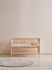 Obraz na płótnie Canvas Baby room cradle and crib, bed with frame and lamp concept, pink wall background.