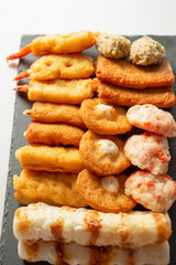 Japanese assorted fish cakes on white background 