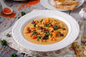 Carrot lentils cream with bacon