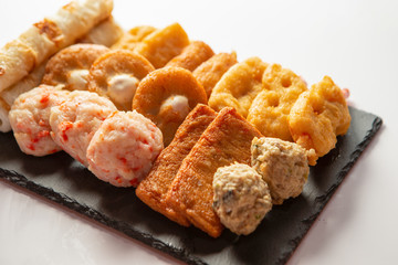 Japanese assorted fish cakes on white background 