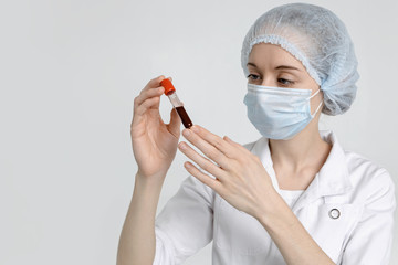 Coronavirus 2019-nCoV Blood Sample. Isolated scientist on white background. Wuhan, China.