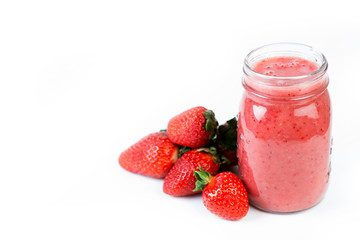 Fresh vegan drink, strawberry smoothie on a white background. Copy space