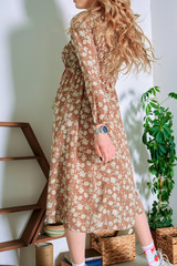 fashionable clothes on a beautiful girl in a photo Studio for the spring show