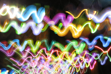 abstract photo of colorful lights in the dark background