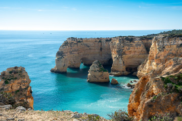 high cliffs on the shore of the Atlantic Ocean. Portugal. Algarve.