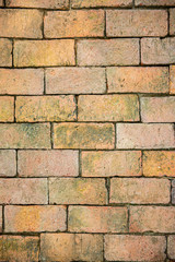 Picture of the red brick working wall Is a brick used in ancient times