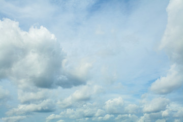 Naklejka na ściany i meble Fluffy Clouds In Blue Sky. Background From Clouds.