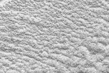 black and white decorative plaster background, dark gray stucco wall with copyspace , abstract wallpaper close up ,ice macro, frozen winter texture