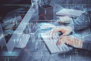 Double exposure of financial graph with man works in office on background. Concept of analysis.