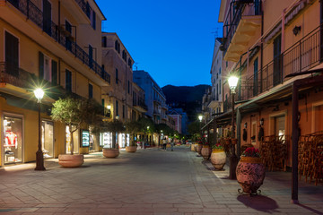 Night view of Alassio narrow street, Italian Riviera