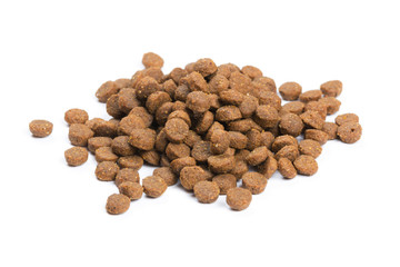 Dry cat food isolated on white background close-up top view