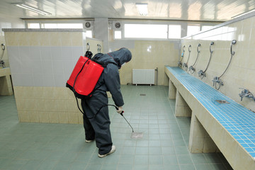 Disinfecting of public toilets to prevent COVID-19