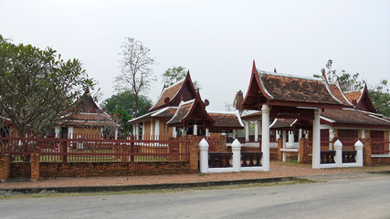 A complex of buildings in traditional Thai style. Thai architecture. entrance to the Famous Sukhothai Historical Park, Thailand