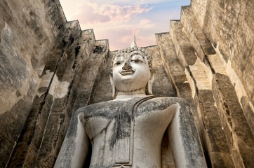 Big Buddha statue of Ancient Thai Temple (Wat Si Chum). Famous Sukhothai Historical Park, a UNESCO...