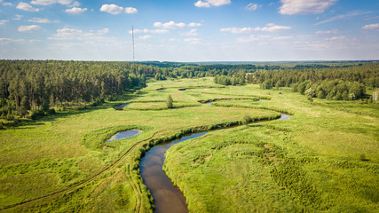 Field and river Usherka near Sudogda in summer, shooting from a quadcopter. Russia, Vladimir region