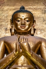 Standing Buddha statue at Ananda Pagoda