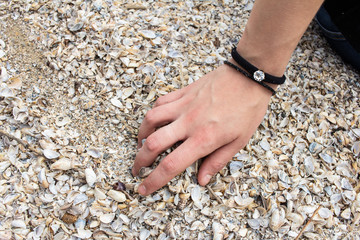 Girl in wet clothes by the sea