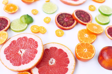 Citrus fruits on white background - lemon, lime, orange, grapefruit