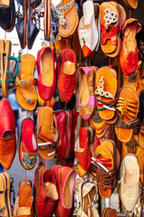 Traditional vibrant Moroccan slippers  on the market.