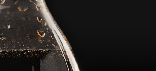 Water drops in bottle with drink. Background close-up, view of drops of water inside of the bottle....