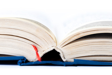Simple opened empty light blue thick book with red tab, white background, macro, closeup, text...
