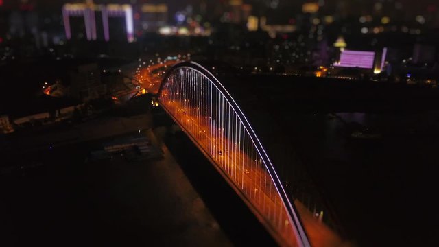 night illuminated wuhan city famous traffic bridge top aerial panorama 4k tilt shift china