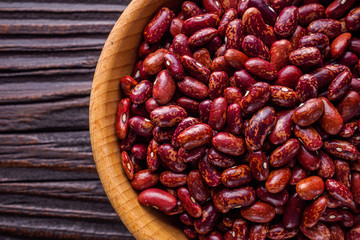Fresh organic natural beans on wooden rustic background