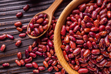 Fresh organic natural beans on wooden rustic background