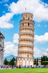 Fototapeta na wymiar Picturesque landscape with church and famous sloping tower in Pisa, Italy. fascinating exotic amazing places.