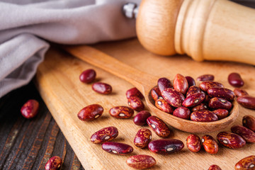 Fresh organic natural beans on wooden rustic background