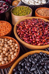 Fresh organic natural beans on wooden rustic background