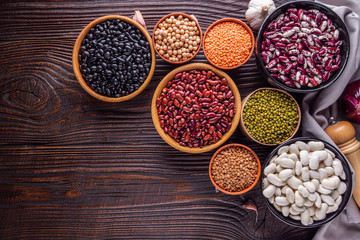 Fresh organic natural beans on wooden rustic background