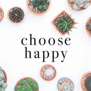 Inspirational quote "Choose Happy". Cactus plant on white background.
