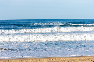 Sport surfing on the beach of zurriola located in san sebastian spain