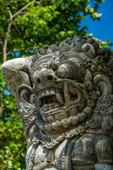 Fototapeta na wymiar Ancient Balinese statue at the temple
