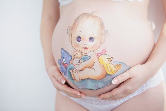 Lovely drawing on the stomach of a pregnant woman