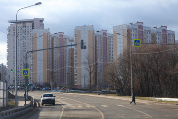 Moscow Region, road and buildings in Peredelkino district on winter day