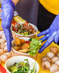 snails at the counter of the street food festival