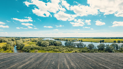 Terrace with a wonderful view. Panorama with the river Elbe and an imposing blue and white sky. Live in nature. Germany