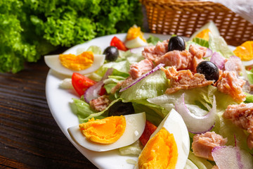 tuna salad on dark wooden rustic background