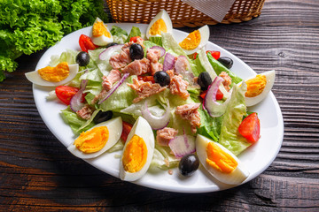 tuna salad on dark wooden rustic background