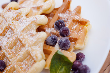 Belgian waffles with fresh berries and mint