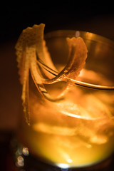 Old fashioned cocktail with orange peel
