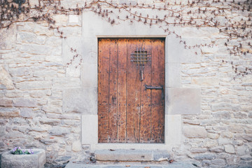 Antique medieval door in Spanish town